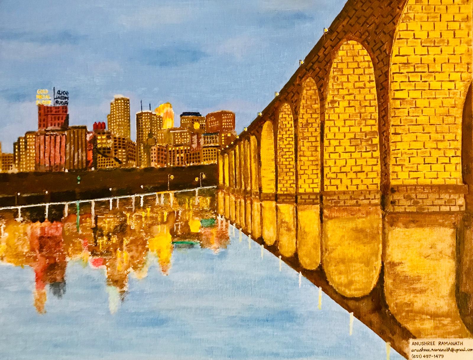 A painting of the illuminated Minneapolis skyline and Stone Arch Bridge reflected in the Mississippi River